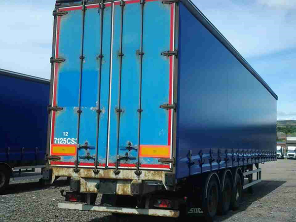 blue montracon trailer from rear